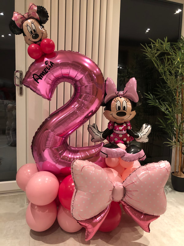 Minnie Mouse birthday balloons in Manchester with pink foil number 2.