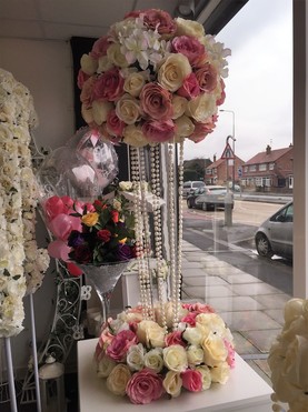 pink rose and pearl wedding centrepiece manchester
