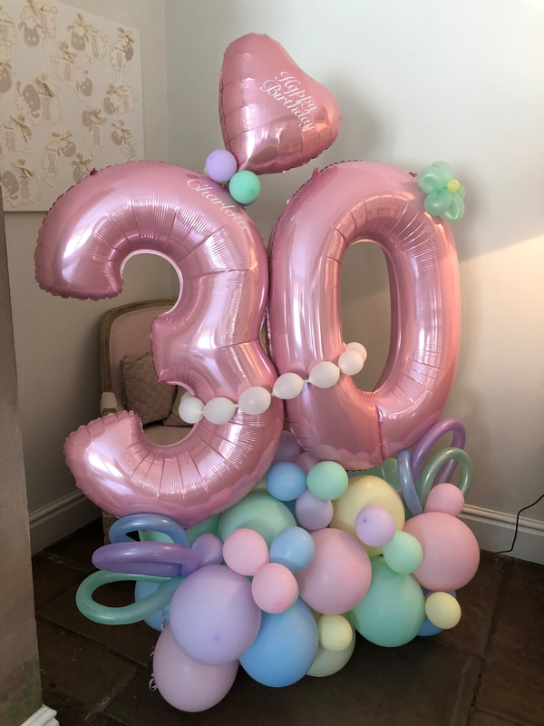 Personalised 30th Birthday balloons Cheshire in pastel colours.