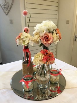 Vintage vases in pink and coral with hessian and lace manchester